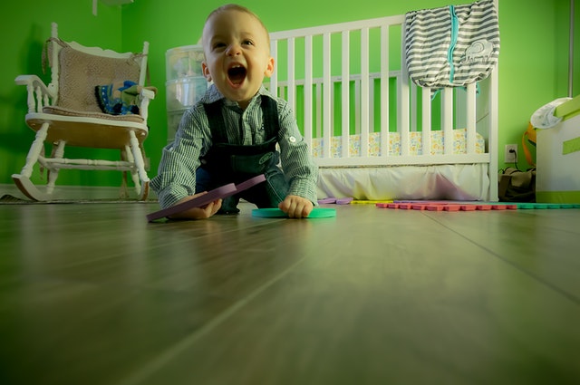 Kid on clean and tidy floor